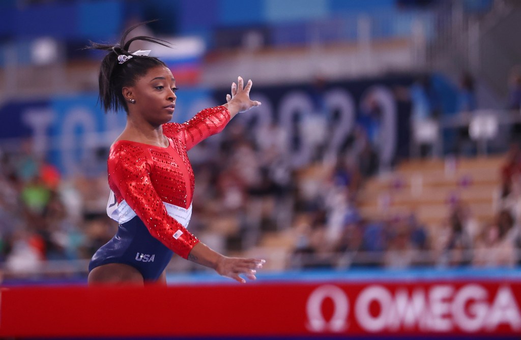 Osaka upset Biles injured