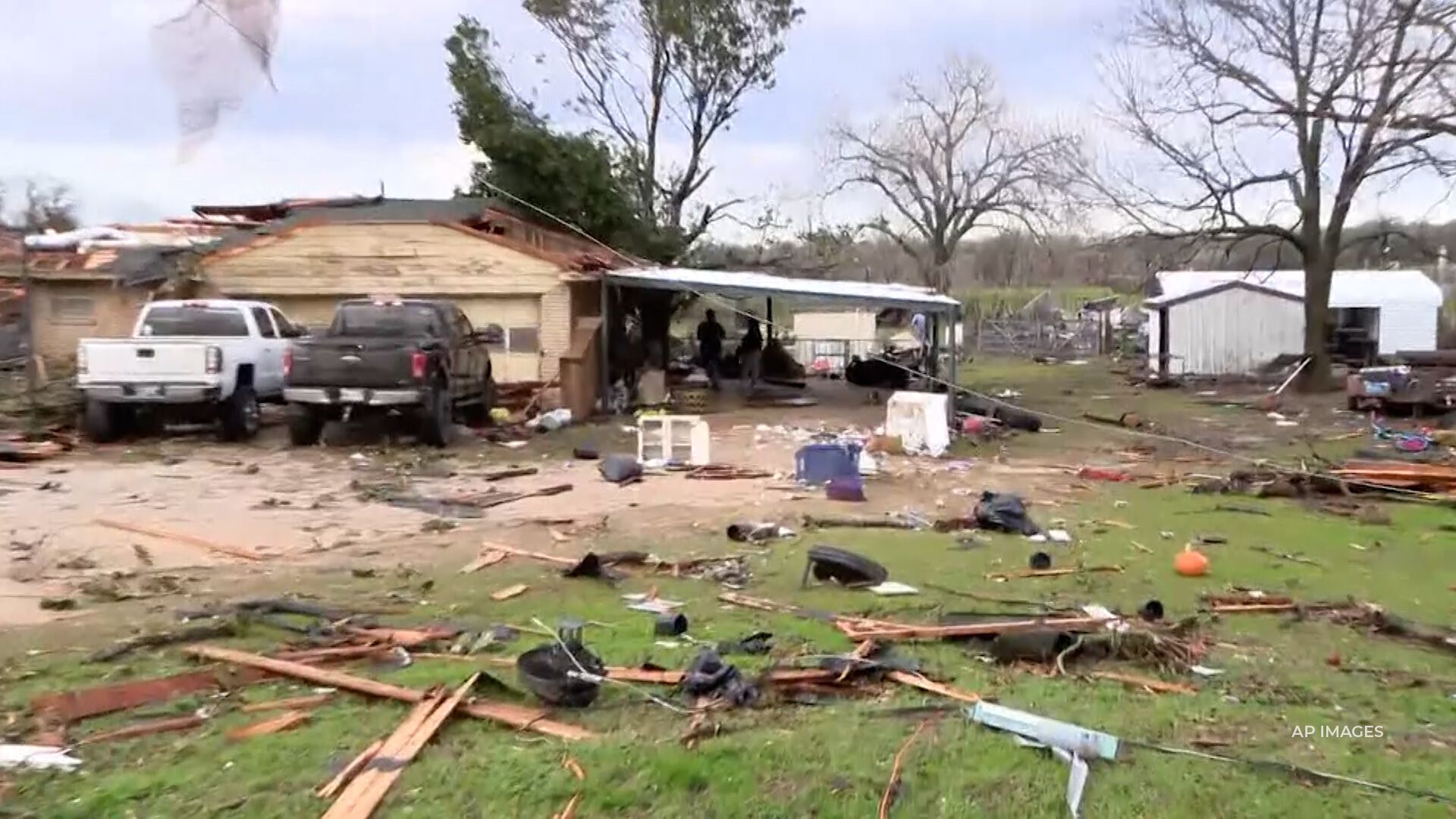 Two are dead and dozens of others injured from a massive storm that produced twisters across the South and blizzards in the Great Plains.