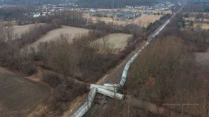 A train derailed outside of Detroit this morning. At least six cars are off the tracks, one of them carrying hazardous materials.