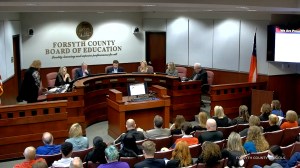 A Georgia school district may pay $107,500 in legal bills after it stopped parents from reading certain books at its school board meetings.