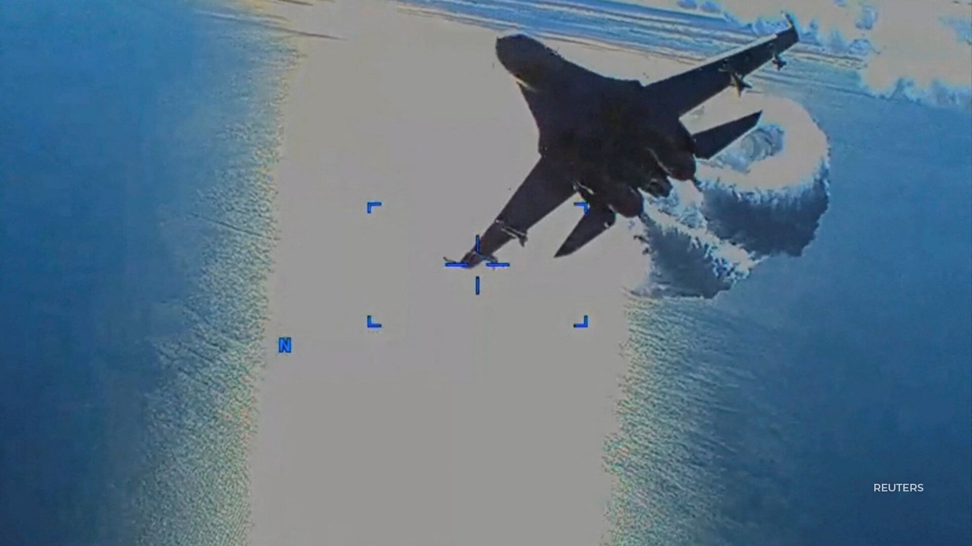 The U.S. military has released a declassified video showing a Russian fighter jet colliding with a U.S. drone.