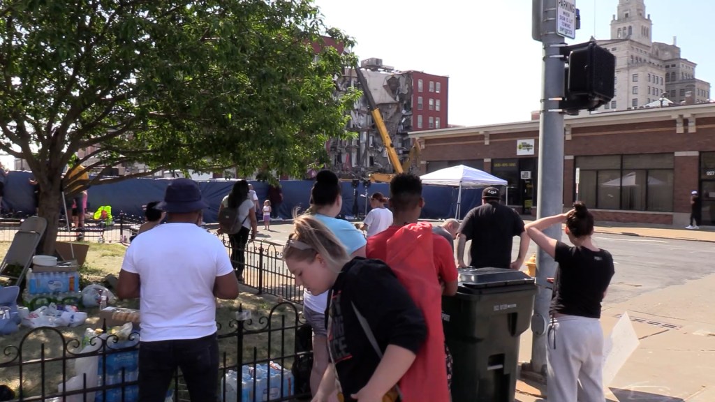 Davenport residents gathered near the collapsed Davenport Hotel building. 