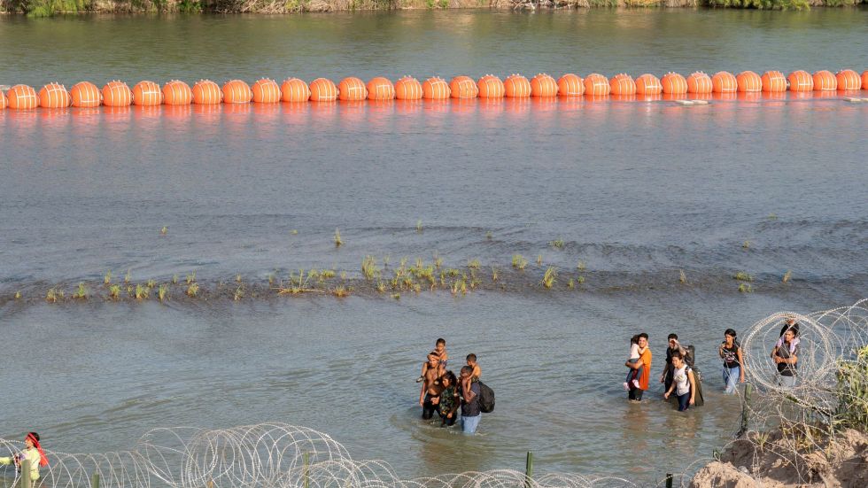 The Justice Department is asking a judge to order Gov. Greg Abbott to remove buoys in the Rio Grande but House Republicans fully back him.