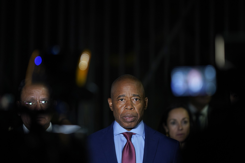 New York City Mayor Eric Adams talks to the press in front of the Basilica of Our Lady of Guadalupe, Wednesday, Oct. 4, 2023, in Mexico City. 