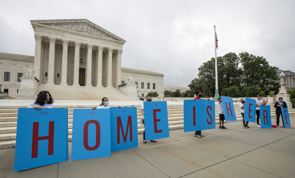 FILE - Deferred Action for Childhood Arrivals (DACA) students gather in front of the Supreme Court in Washington, June 18, 2020. A federal judge on Wednesday, Sept. 13, 2023, declared illegal a revised version of a federal policy that prevents the deportation of hundreds of thousands of immigrants brought to the U.S. as children. (AP Photo/Manuel Balce Ceneta, File)