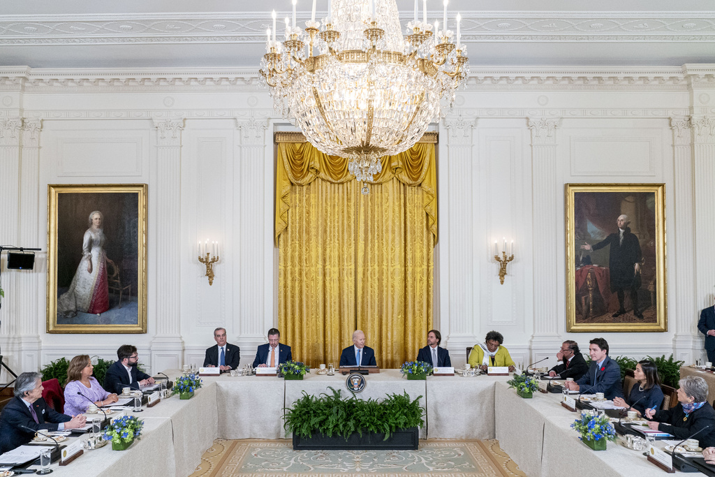 President Joe Biden, accompanied by Western Hemisphere leaders, from left, President Guillermo Lasso of Ecuador, President Dina Boluarte of Peru, President Gabriel Boric of Chile, President Luis Abinader of the Dominican Republic, President Rodrigo Chaves Robles of Costa Rica, Biden, President Luis Lacalle Pou of Uruguay, Prime Minister Mia Mottley of Barbados, President Gustavo Petro of Colombia, Prime Minister Justin Trudeau of Canada, Foreign Minister Janaina Tewaney of Panama, and Secretary of Foreign Affairs Alicia Bárcena of Mexico, speaks during the inaugural Americas Partnership for Economic Prosperity Leaders' Summit at the White House, Friday, Nov. 3, 2023, in Washington. (AP Photo/Andrew Harnik)