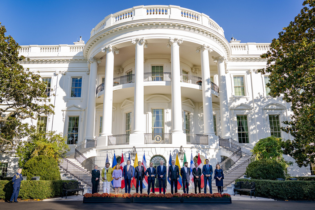 Western Hemisphere leaders, from left, Secretary of Foreign Affairs Alicia Bárcena of Mexico, Prime Minister Mia Mottley of Barbados, President Dina Boluarte of Peru, President Rodrigo Chaves Robles of Costa Rica, President Guillermo Lasso of Ecuador, President Luis Lacalle Pou of Uruguay, President Joe Biden, President Luis Abinader of the Dominican Republic, President Gabriel Boric of Chile, President Gustavo Petro of Colombia, Prime Minister Justin Trudeau of Canada, and Foreign Minister Janaina Tewaney of Panama pose for photographs on the South Portico for the inaugural Americas Partnership for Economic Prosperity Leaders' Summit at the White House, Friday, Nov. 3, 2023, in Washington. (AP Photo/Andrew Harnik)