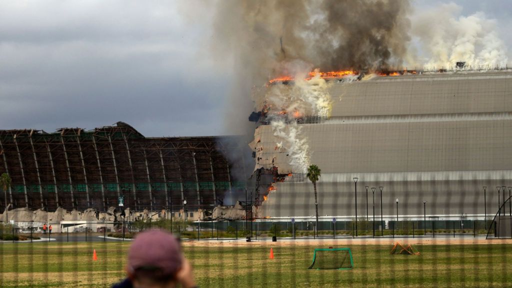Massive blimp hangar fire shuts down schools, parks due to toxic chemicals