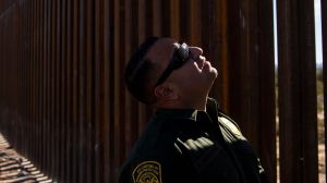 NewsNation reporters contacted Border Patrol after illegal immigrant smugglers taunted them while cutting a hole in the border wall.