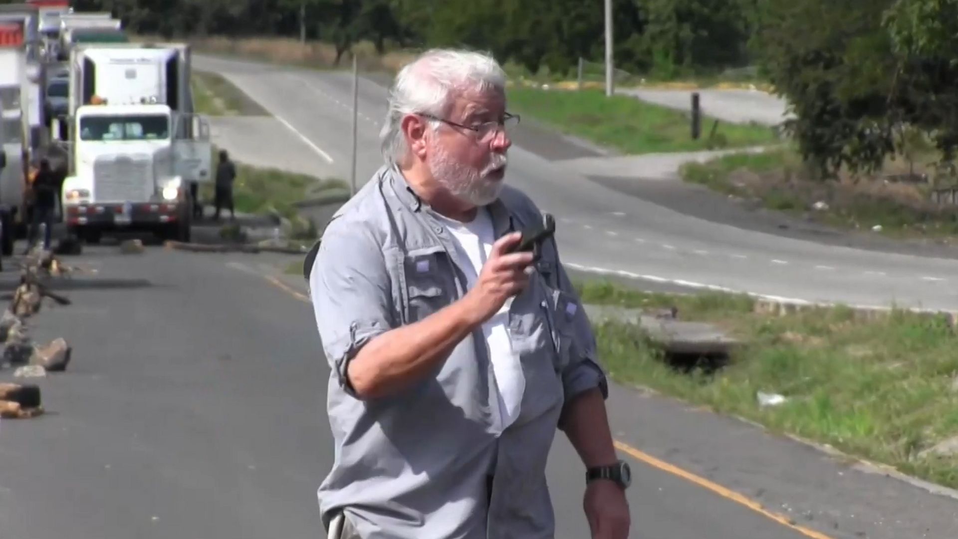 Two people died when a gunman opened fire during an environmental protest. Kenneth Darlington, a U.S. citizen born in Panama, was arrested.