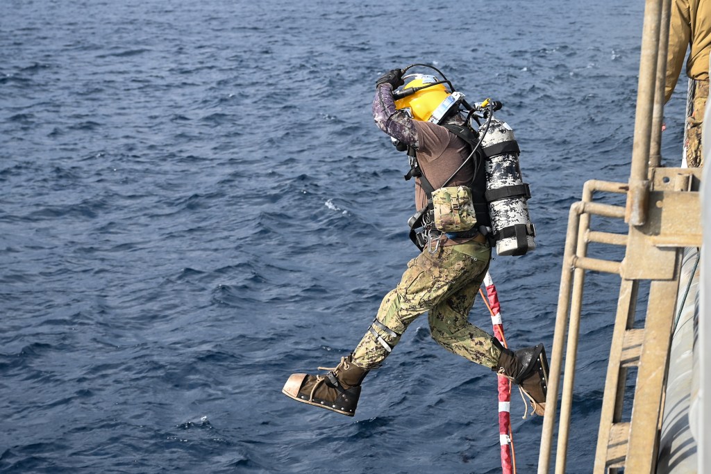 U.S. Navy Sailors during the ongoing CV-22 Osprey recovery efforts on Christmas Day 2023. The U.S. Military, alongside the Japan Coast Guard, Japan Self-Defense Forces, local law enforcement, and Japanese civilian volunteers has been conducting intensive search, rescue and recovery operations for the CV-22 Osprey crew and aircraft debris following the mishap that occurred on 29 November 2023 off the shore of Yakushima Island, Japan. Seven of the eight crew's bodies have been recovered. Locating and recovering the eighth Airman onboard the CV-22 remains the primary effort. Where: Yakushima Island, Japan When: 25 Dec 2023 Credit: US Navy/Cover Images **EDITORIAL USE ONLY. MATERIALS ONLY TO BE USED IN CONJUNCTION WITH EDITORIAL STORY. THE USE OF THESE MATERIALS FOR ADVERTISING, MARKETING OR ANY OTHER COMMERCIAL PURPOSE IS STRICTLY PROHIBITED. MATERIAL COPYRIGHT REMAINS WITH STATED SUPPLIER.**