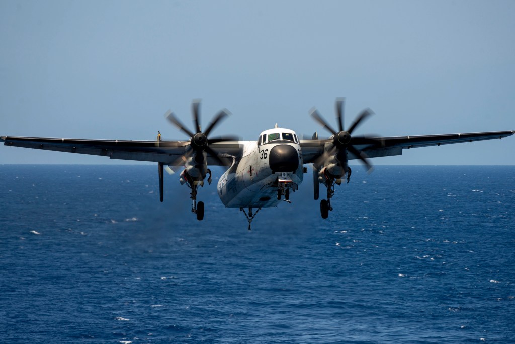 230511-N-WM182-1050 PHILIPPINE SEA (May 11, 2023) A C-2 Greyhound from the “Providers” of Fleet Logistics Support Squadron (VRC) 30 prepares to make an arrested landing on the flight deck of the aircraft carrier USS Nimitz (CVN 68). Nimitz is in U.S. 7th Fleet conducting routine operations. 7th Fleet is the U.S. Navy's largest forward-deployed numbered fleet, and routinely interacts and operates with allies and partners in preserving a free and open Indo-Pacific region. (U.S. Navy photo by Mass Communication Specialist 2nd Class Caitlin Flynn)