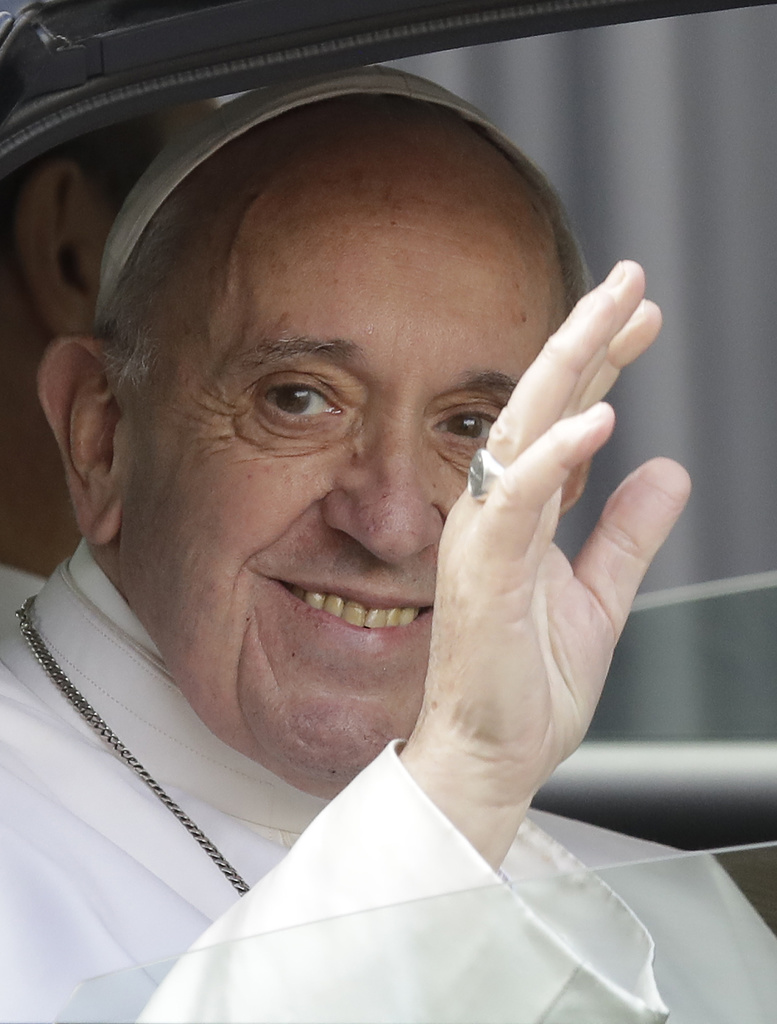 Pope Francis salutes as he leaves the St. John in Lateran Basilica after meeting parishioners in Rome, Thursday, March 2, 2017. (AP Photo/Andrew Medichini)