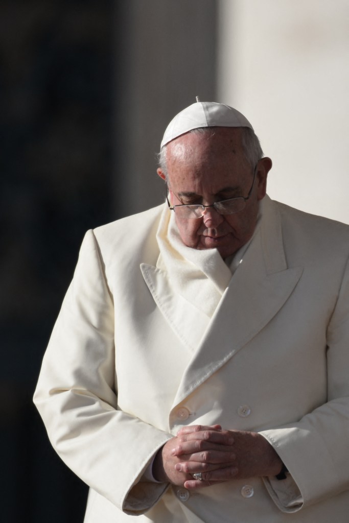 Pope Francis gives a general audience at St Peter's square on December 11, 2013 at the Vatican.  AFP PHOTO / VINCENZO PINTO (Photo by Vincenzo PINTO / AFP) (Photo by VINCENZO PINTO/AFP via Getty Images)