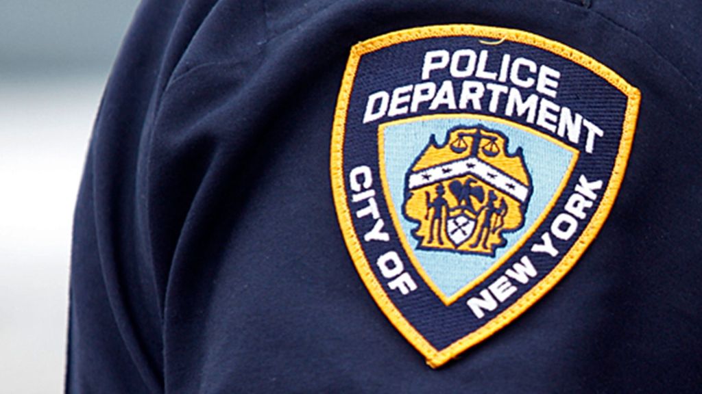 Four migrants were charged with assault after a scuffle with NYPD officers in Manhattan, during which the officers were kicked in the head and body by other individuals.