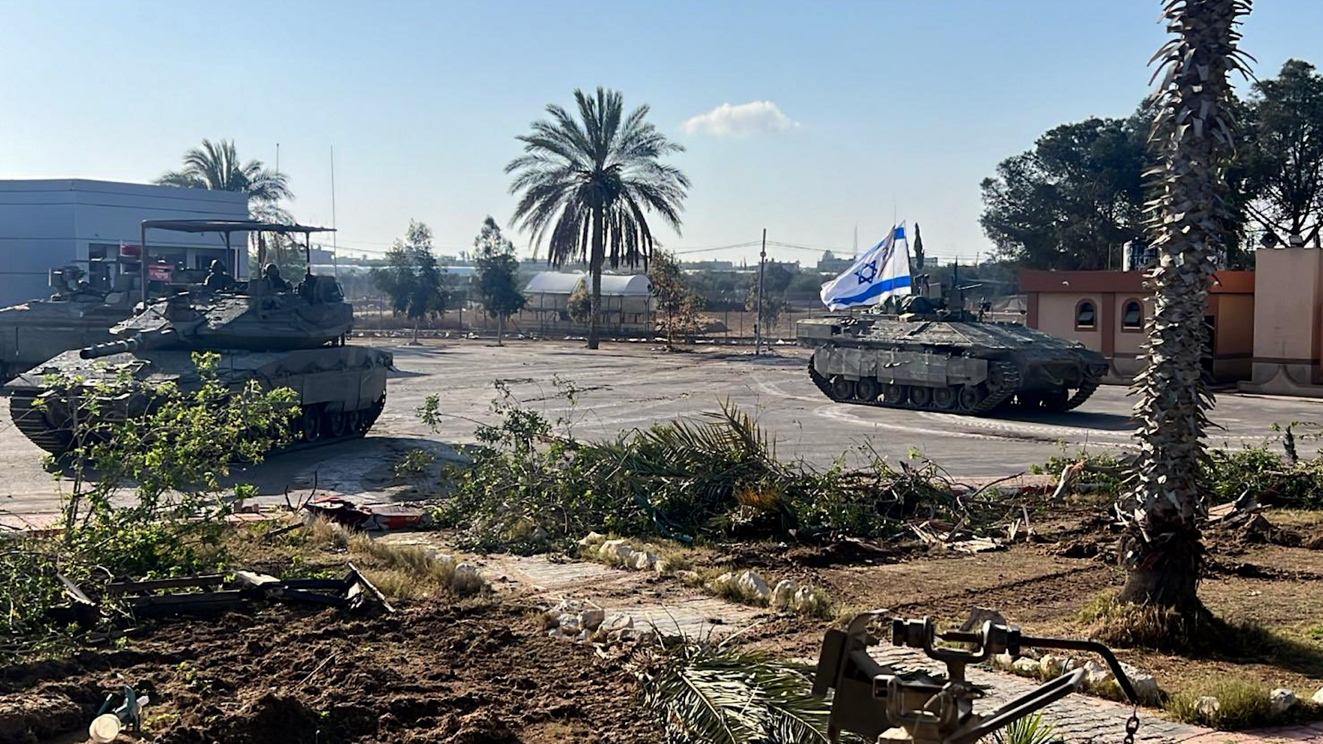 The Israeli military seizes control of the Rafah crossing between Gaza and Egypt amid talks of a cease-fire.