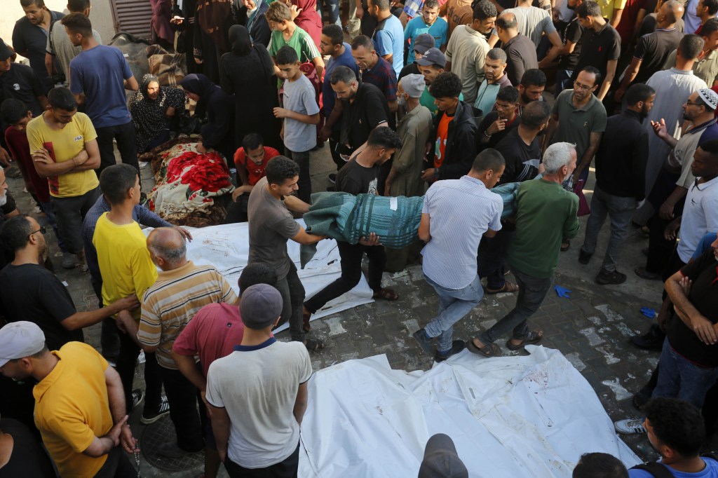 DEIR AL BALAH, GAZA - JUNE 06: The dead bodies of the Palestinians are brought to the Al Aqa Martyrs hospital after the United Nations Relief and Works Agency for Palestine Refugees (UNRWA) school sheltering thousands of people, is bombed by the Isreali army, on June 06, 2024 in Deir Al Balah, Gaza. It was reported that death toll from Israeli airstrike on UNRWA school in Nuseirat refugee camp, central Gaza Strip, rises to 39. (Photo by Ashraf Amra/Anadolu via Getty Images)