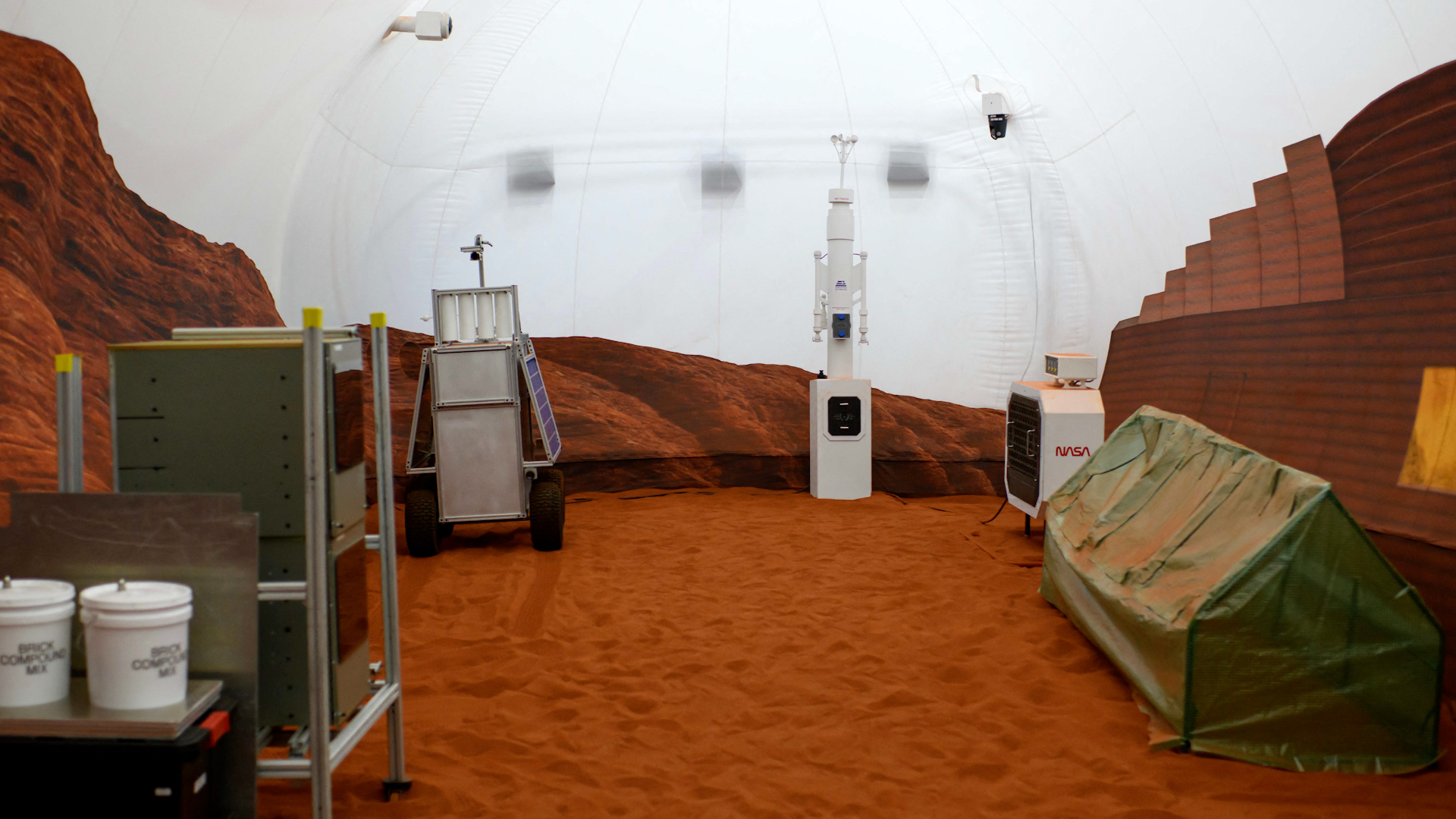 Four NASA volunteers complete year-long Mars simulation at Houston's Johnson Space Center, preparing for future Moon and Mars missions.