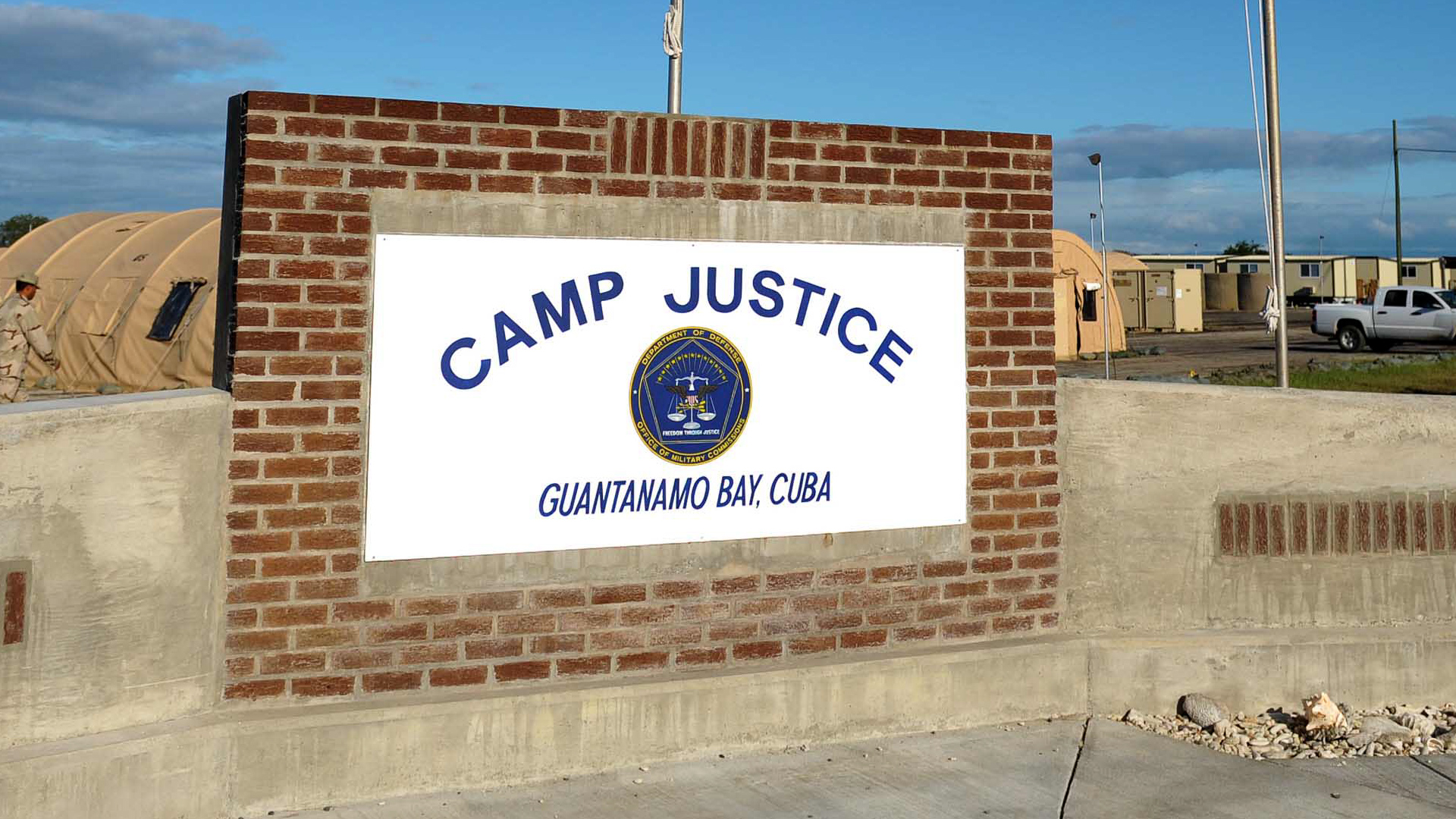 The military hearings at Guantanamo Bay for Khalid Sheikh Mohammed, the alleged mastermind of the September 11 attacks, and two co-defendants are in turmoil. This upheaval stems from Defense Secretary Lloyd Austin's sudden decision to cancel a plea agreement that had been in place.