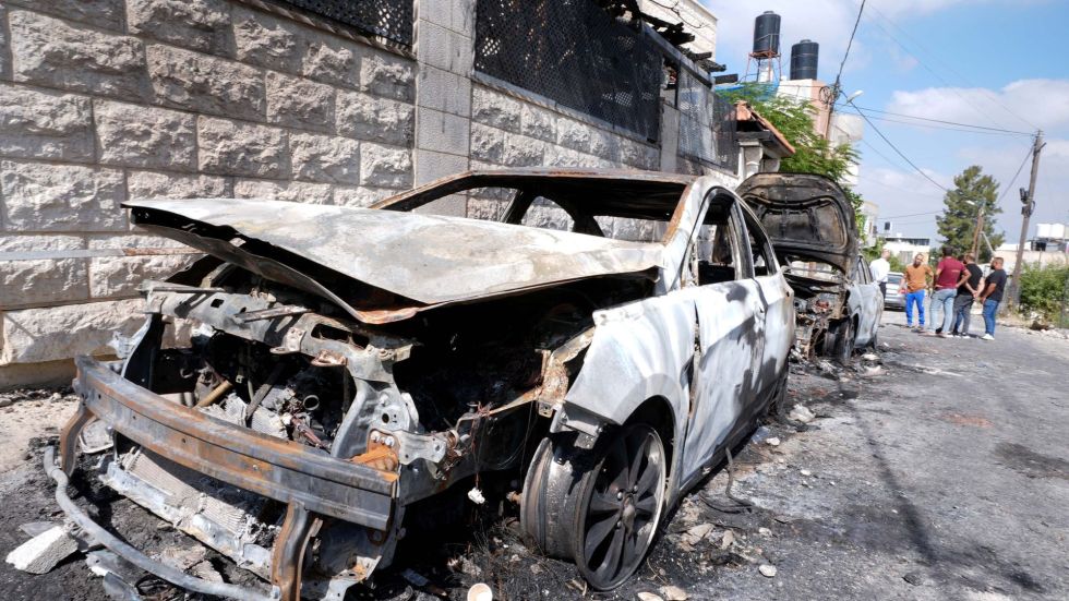 Four people have been arrested in connection with an Israeli settler rampage on a Palestinian village in the West Bank.