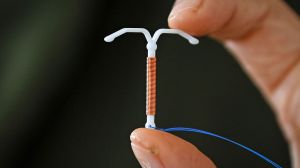 The CDC has issued new guidance for pain management for women getting an IUD, but doesn't make it a requirement.