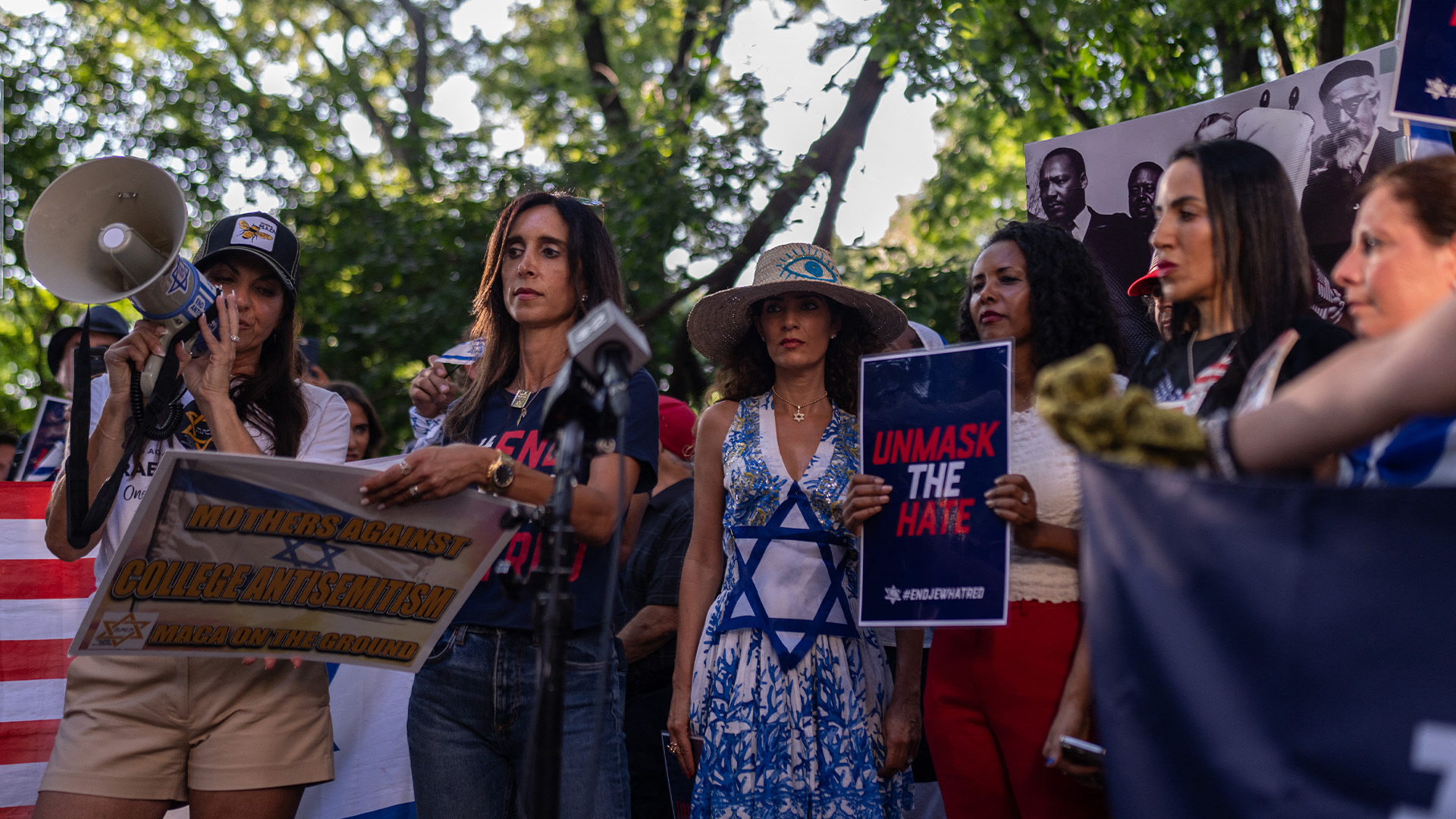 More than 100 pro-Israeli demonstrators gathered near Columbia University to advocate for a face mask and face covering ban during protests.