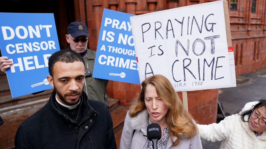 Pro-life activist wins settlement after arrest for silent prayer
