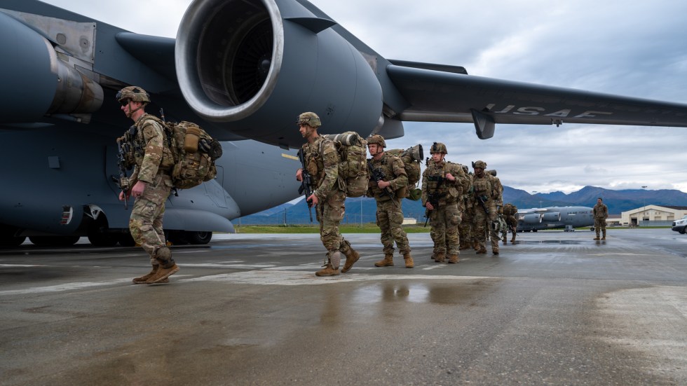 The U.S. deploys 130 soldiers to a western Alaskan island in response to joint Russian-Chinese military drills near American territory.