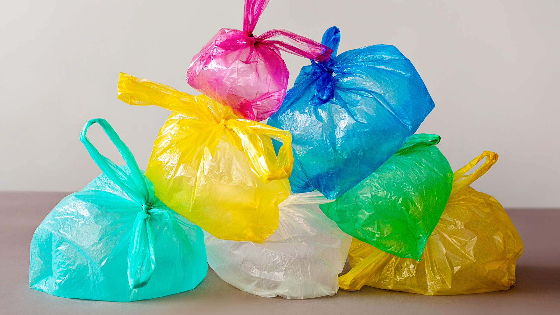 California will ban all plastic grocery bags by Jan. 1, 2026, requiring shoppers to use reusable or paper bags instead.