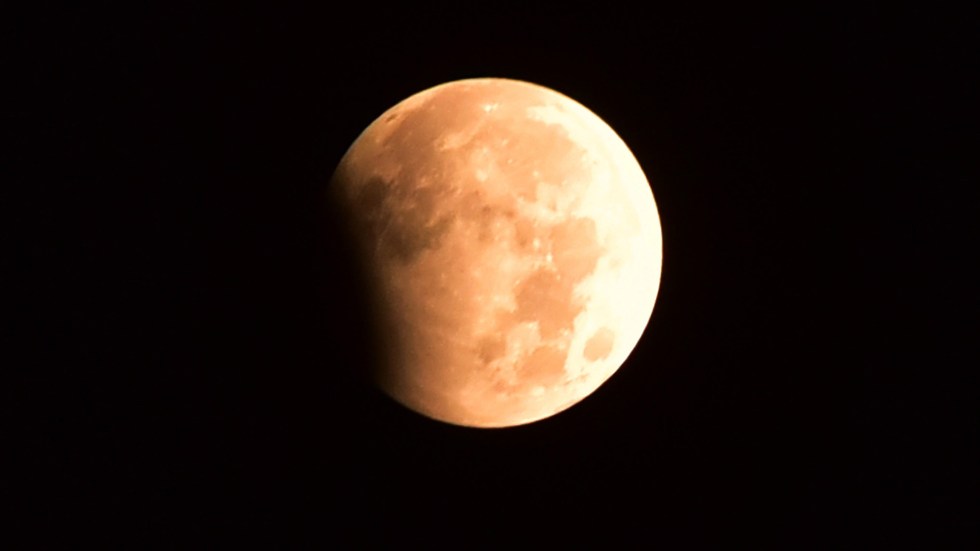 A partial lunar eclipse is expected to create a spectacular sight in the skies on Tuesday into Wednesday, Sept. 18.