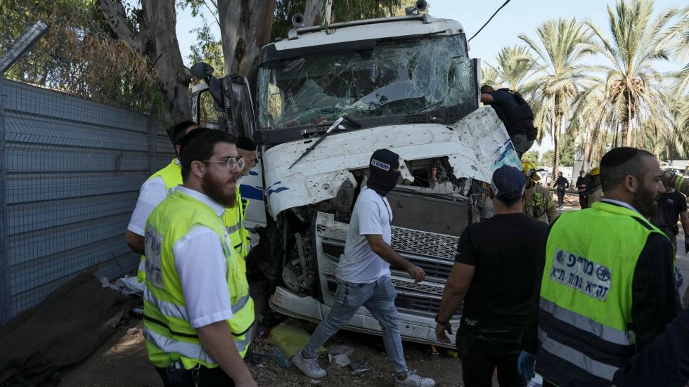 A truck slammed into a crowd at a bus stop in Israel killing at least one person and injuring dozens of others, in what authorities are calling a terrorist attack.