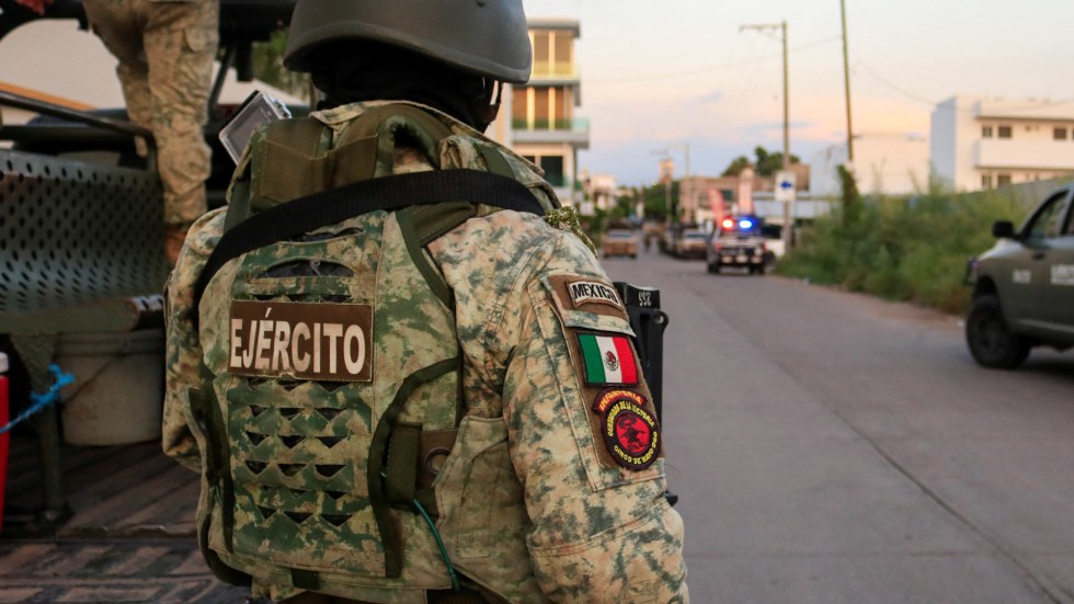 Mexican soldiers shot at a pickup truck carrying 33 migrants near the Guatemalan border on Tuesday, killing six.