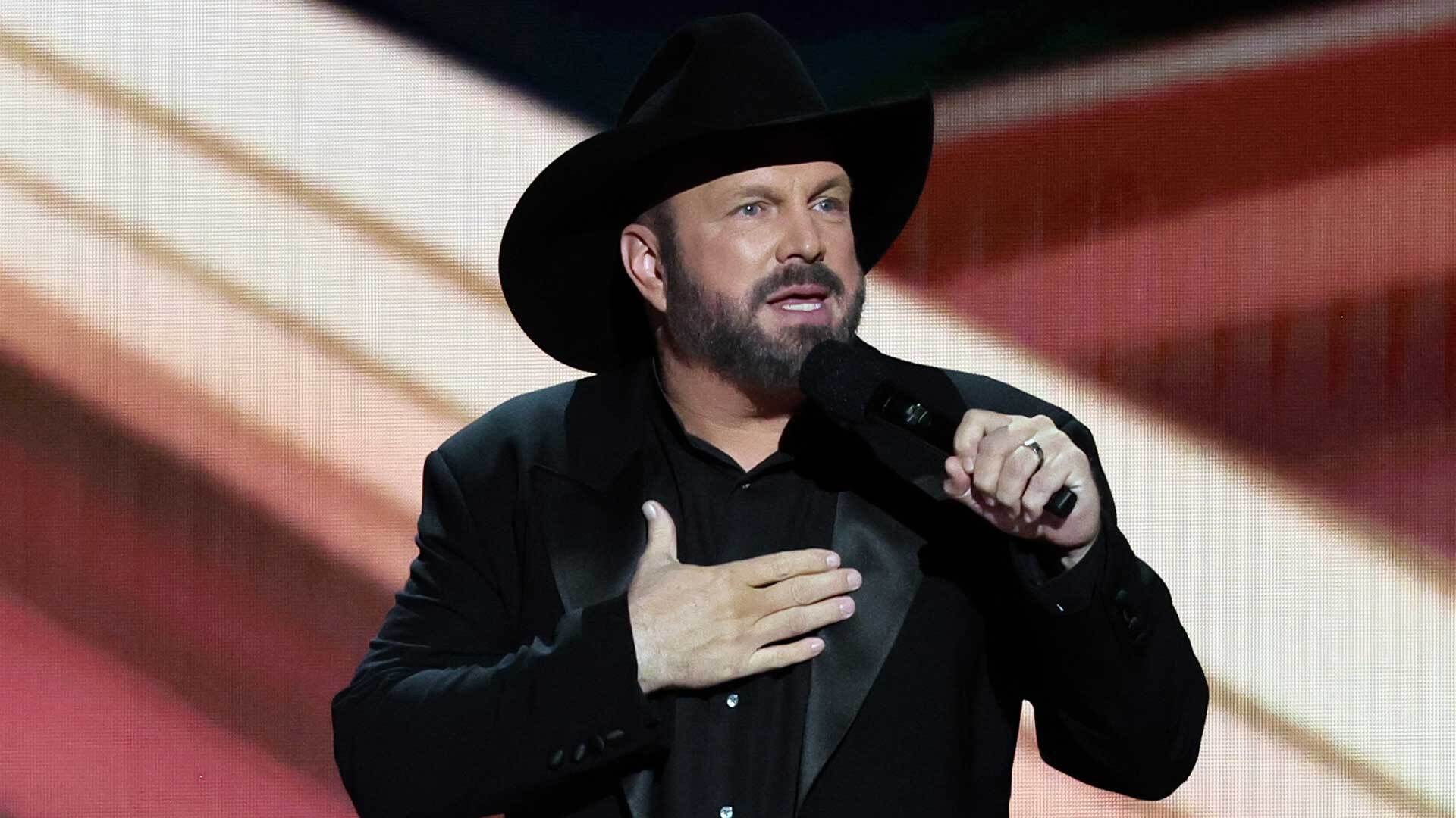 Country music artist Garth Brooks is naming his sexual assault accuser in a lawsuit, claiming she is trying to extort millions from him.