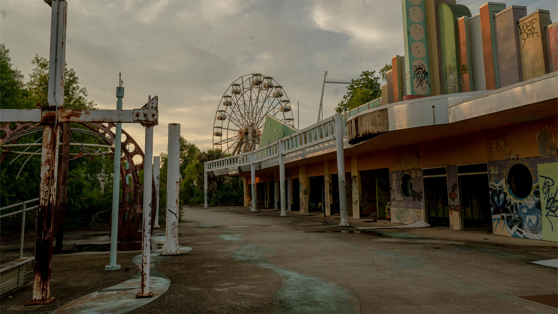 Demolition has started at New Orleans' abandoned Six Flags, closed since Hurricane Katrina. The site is set for redevelopment.