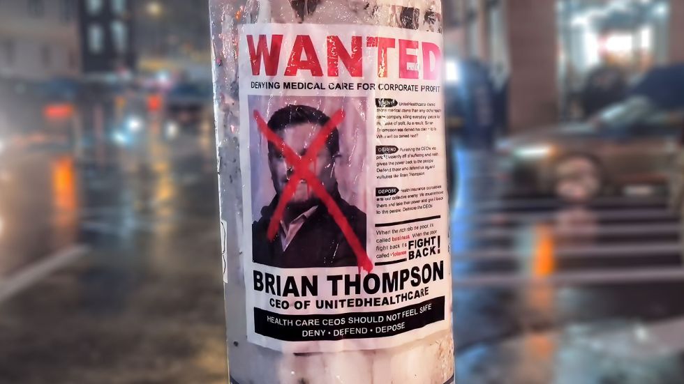 The New York Police Department is looking into who put up a series of 'wanted' posters featuring health insurance executives.