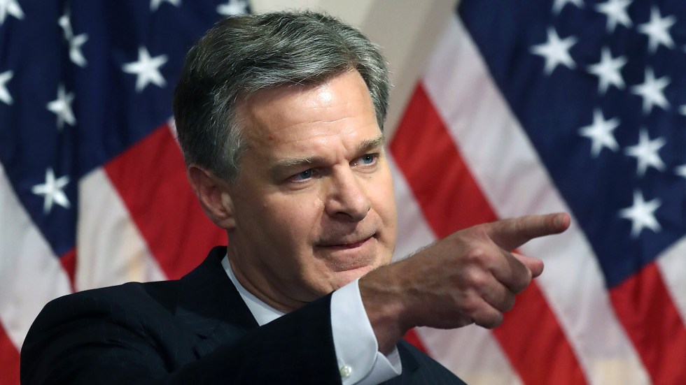 FBI Director Christopher Wray announced his resignation Wednesday, saying he would leave office before Trump's inauguration.