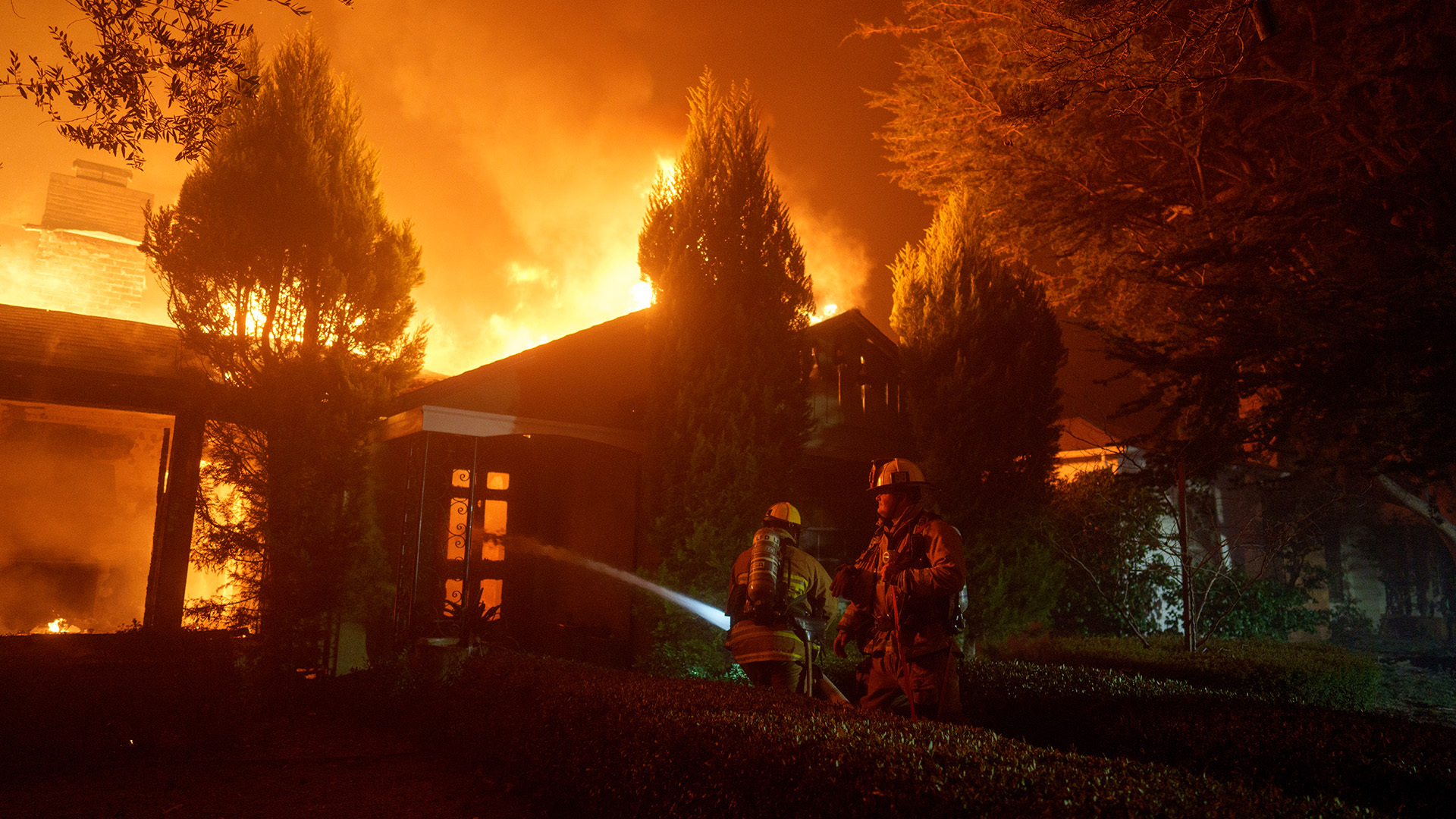 A fast-moving wildfire broke out Tuesday in Los Angeles, covering over 2,900 acres and prompting mandatory evacuations for nearly 30k people.