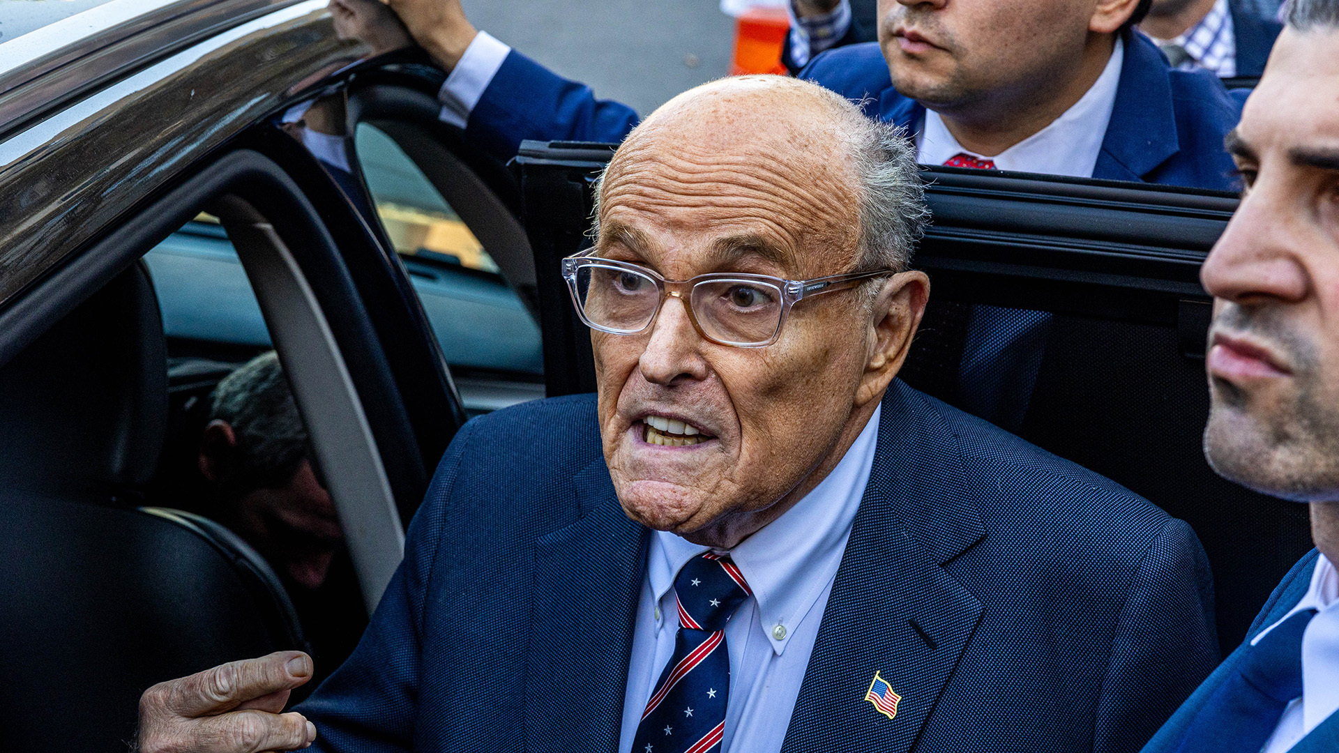 A federal judge found Rudy Giuliani in contempt of court Monday for failing to turn over assets to satisfy a 8 million defamation judgment.