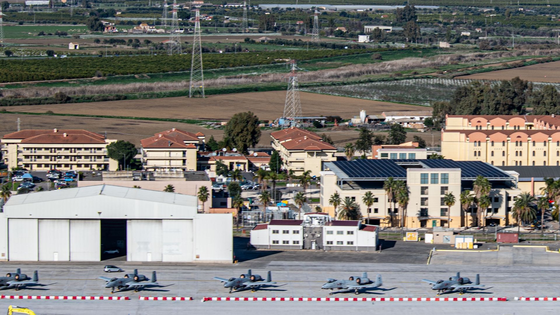 A U.S. Navy air base in Italy was locked down for hours after a potential car bomb targeting the facility was reported to security.