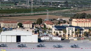 A U.S. Navy air base in Italy was locked down for hours after a potential car bomb targeting the facility was reported to security.